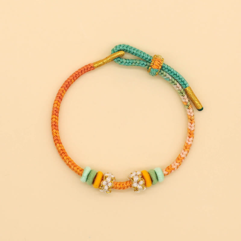 Handmade Eight-Thread Braided Endless Knot Bracelet with Peach Blossom Detail