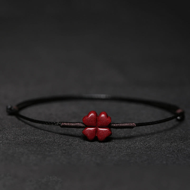 Handmade Cinnabar Braided Red String Bracelet with Carved Symbolic Charms