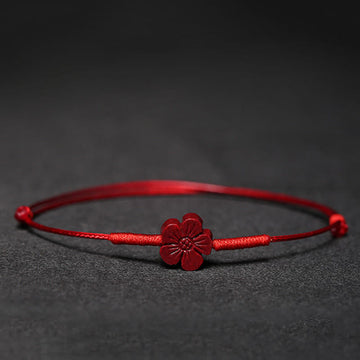 Handmade Cinnabar Braided Red String Bracelet with Carved Symbolic Charms