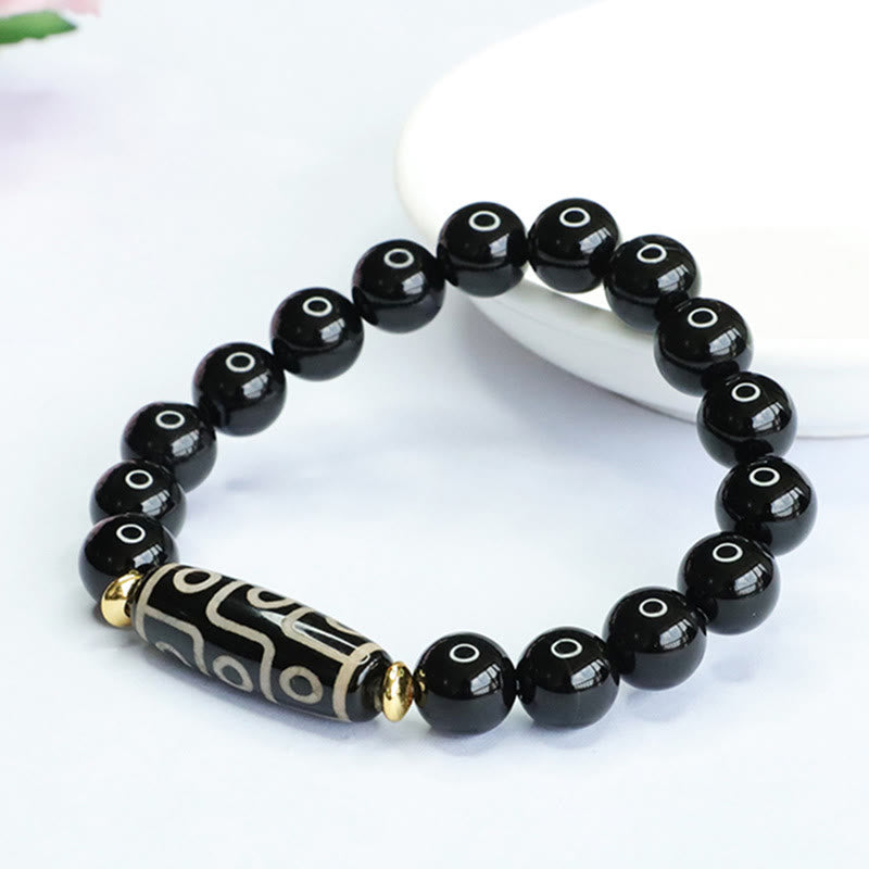 Tibetan Nine-Eye Dzi Bead and Black Onyx Grounding Beaded Bracelet