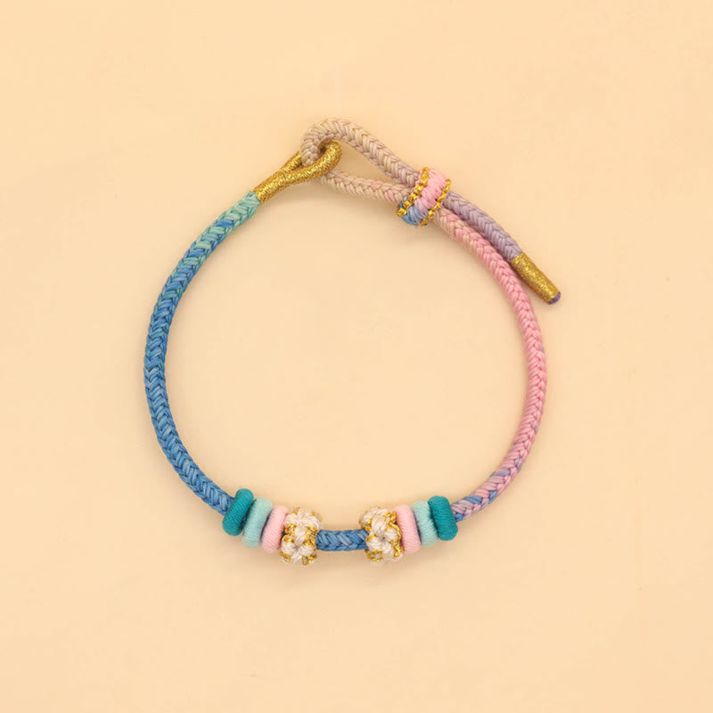 Handmade Eight-Thread Braided Endless Knot Bracelet with Peach Blossom Detail