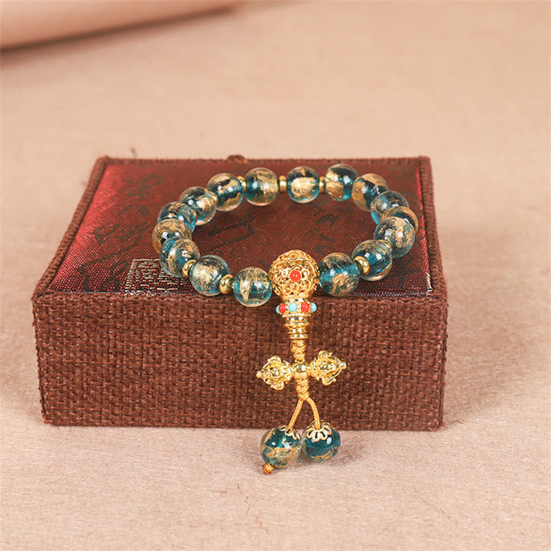 Tibetan Liuli Bead Bracelet with Gold Pixiu and Vajra Dorje Symbols