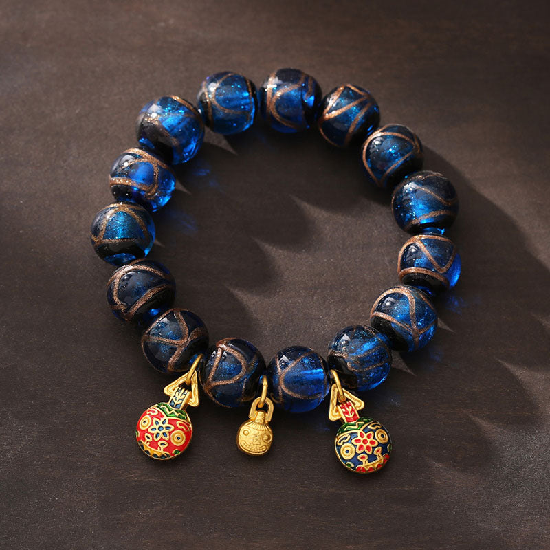 Handcrafted Blue Liuli Glass Bead Bracelet with Gold and Copper Pixiu Focal