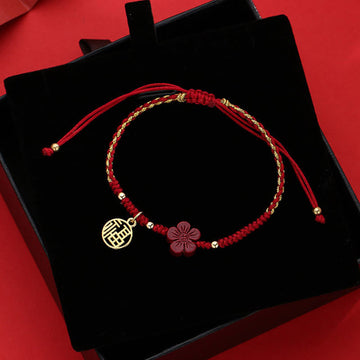 Handmade Red String Cinnabar Flower and Copper Fu Character Braided Bracelet