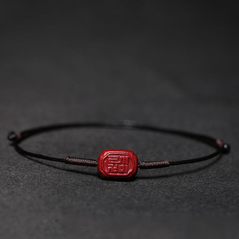 Handmade Cinnabar Braided Red String Bracelet with Carved Symbolic Charms