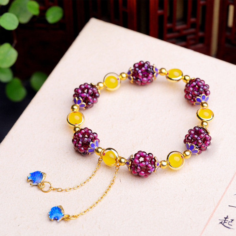 Tibetan-Inspired Handmade Garnet and Amethyst Beaded Bracelet