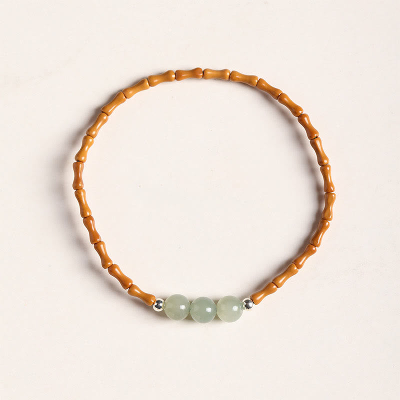 Natural Olive Pit & Hetian Jade Beaded Bracelet with Bamboo Pattern and White Copper Elements