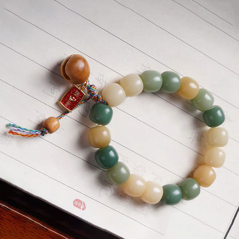 Natural Gradient Bodhi Seed Bracelet with Mokugyo Wooden Fish Charm