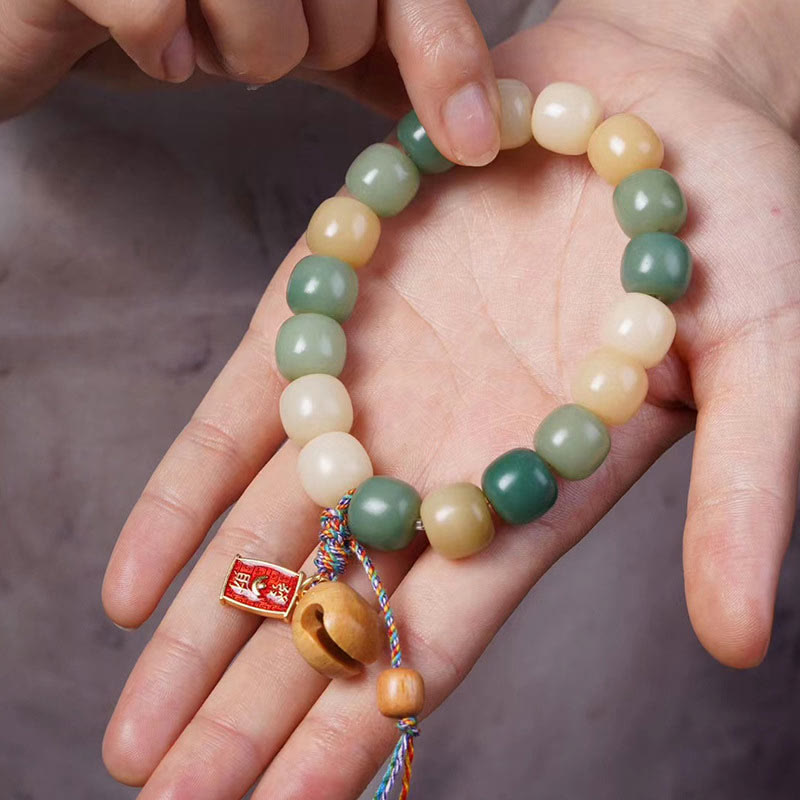 Natural Gradient Bodhi Seed Bracelet with Mokugyo Wooden Fish Charm