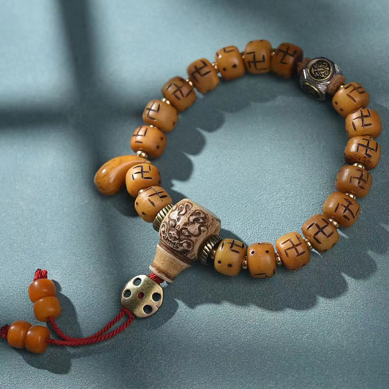 Natural Tibetan Camel Bone Bracelet with Dzi Bead, Shankha, or Kirtimukha Charms