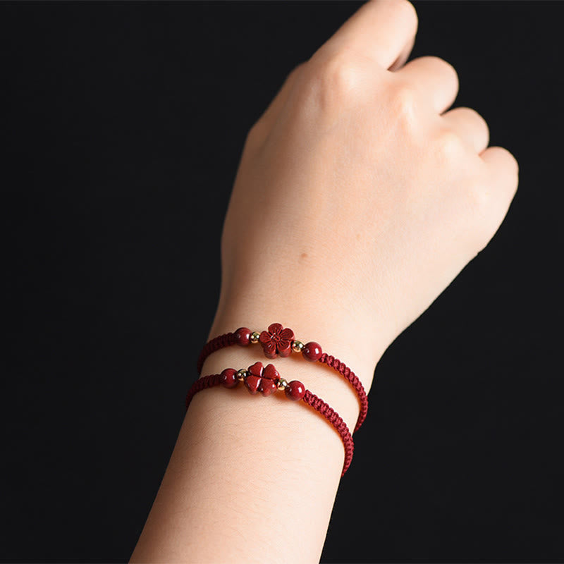 Hand-Woven Red String Cinnabar Clover and Flower Charm Bracelet