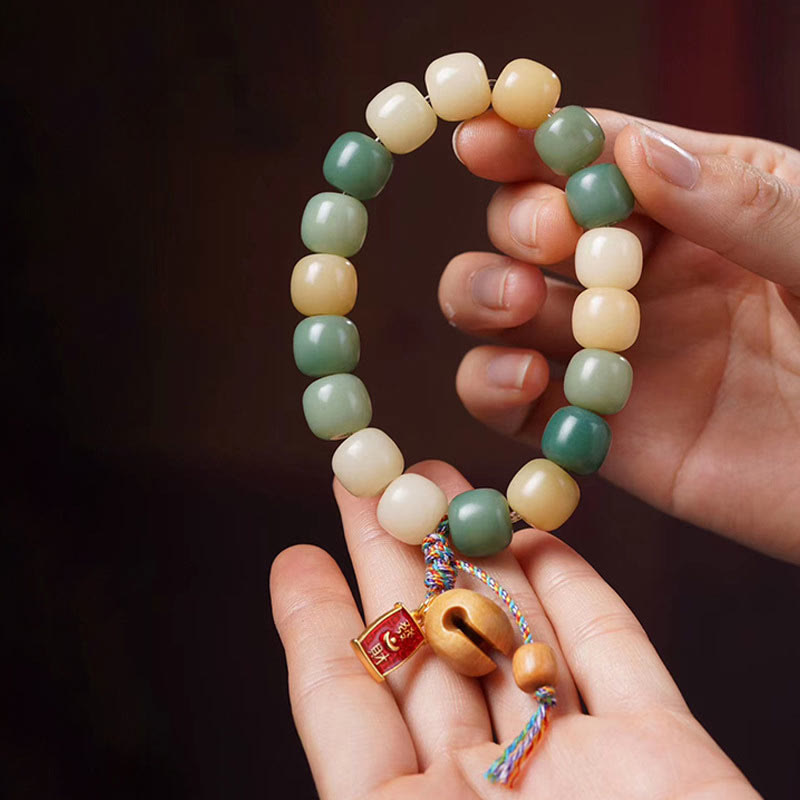 Natural Gradient Bodhi Seed Bracelet with Mokugyo Wooden Fish Charm