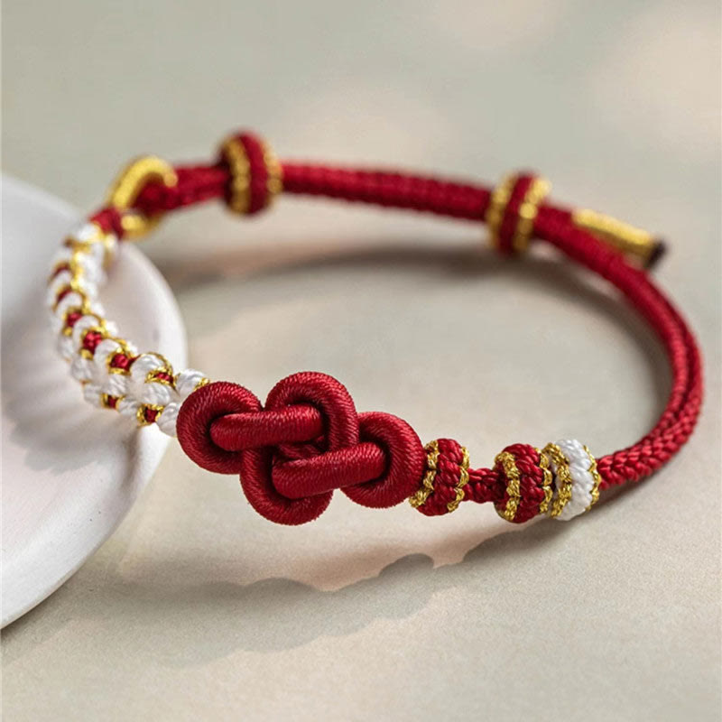 Hand-Braided Red String Bracelet with Copper Endless Knot & Peach Blossom Charm