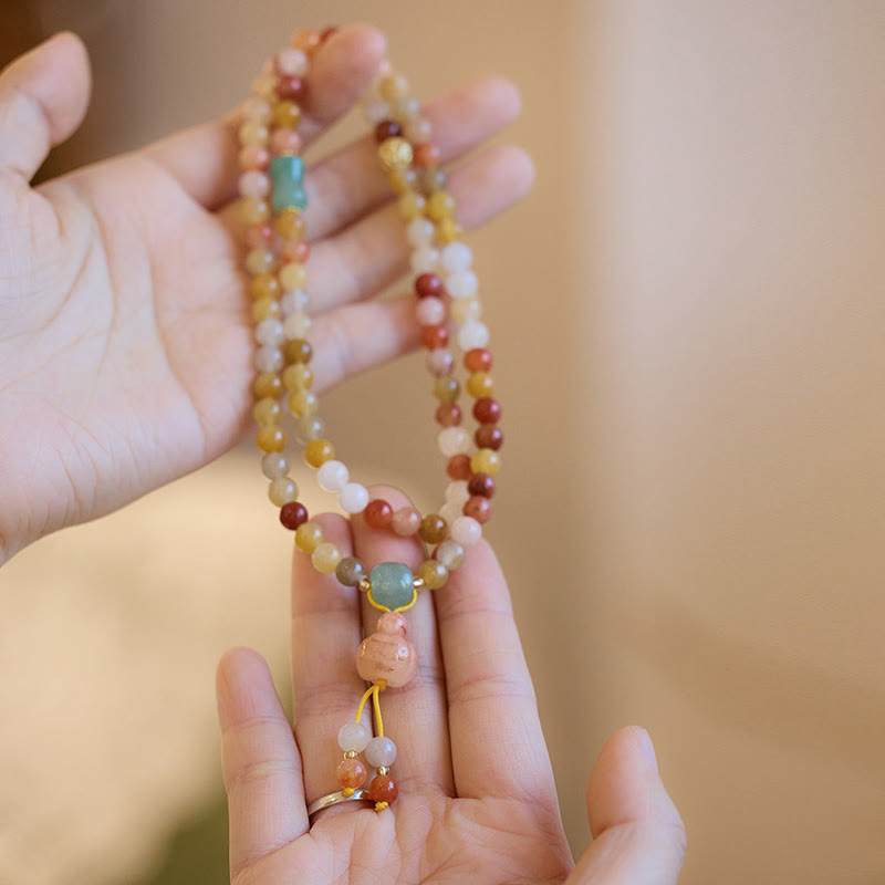 Natural Golden Silk Jade and Gold Plated Pumpkin Charm Triple Wrap Bracelet