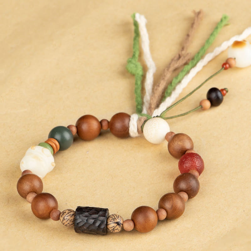 Lightning Struck Wood & Bodhi Seed Cat Paw Tassel Bracelet with Red Agate and Onyx