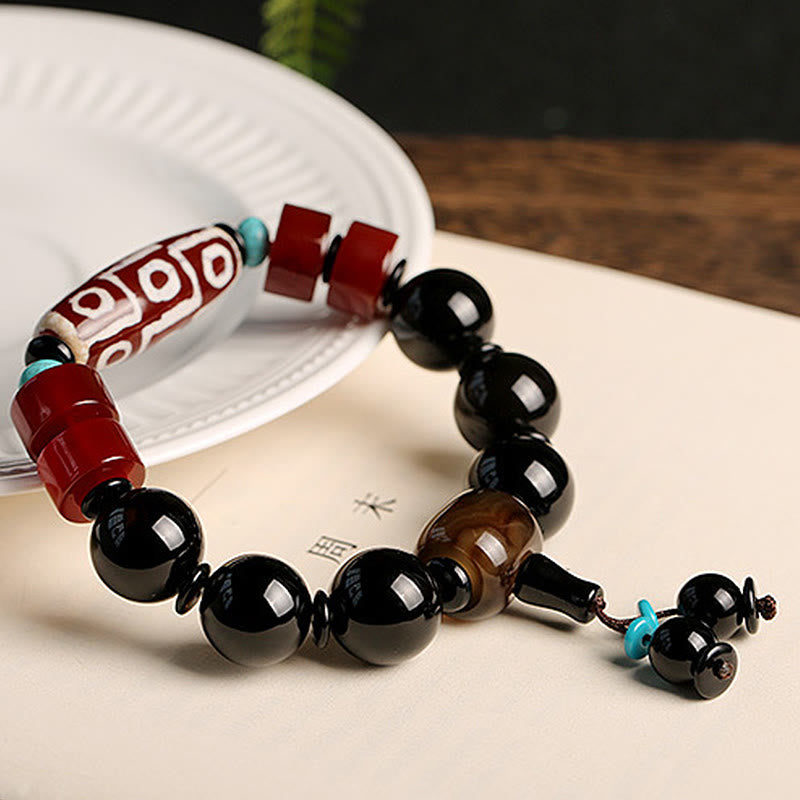 Tibetan Nine-Eye Dzi Bead and Polished Black Onyx Natural Stone Bracelet