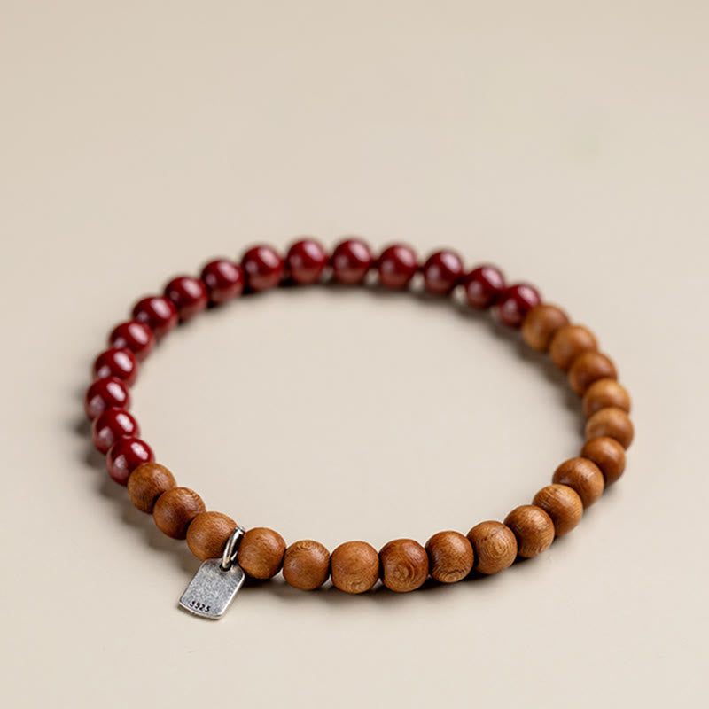 Handmade 925 Sterling Silver Peach Wood and Cinnabar Beaded Stretch Bracelet