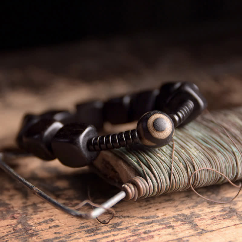 Handmade Tibetan Ebony Wood and Dzi Bead Strength Bracelet
