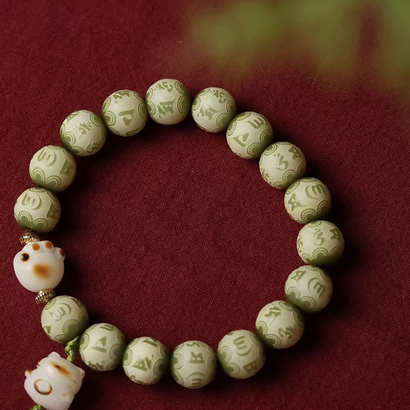 Green Bodhi Seed Om Mani Padme Hum Engraved Cat Paw Bracelet