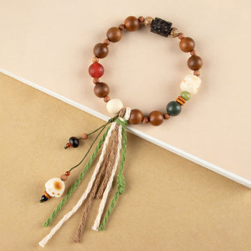 Lightning Struck Wood & Bodhi Seed Cat Paw Tassel Bracelet with Red Agate and Onyx