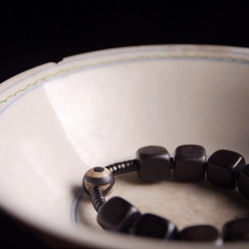 Handmade Tibetan Ebony Wood and Dzi Bead Strength Bracelet
