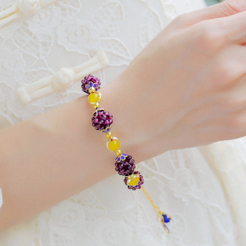 Tibetan-Inspired Handmade Garnet and Amethyst Beaded Bracelet