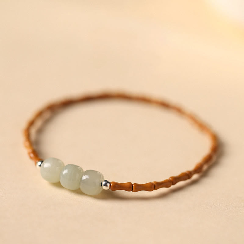 Natural Olive Pit & Hetian Jade Beaded Bracelet with Bamboo Pattern and White Copper Elements