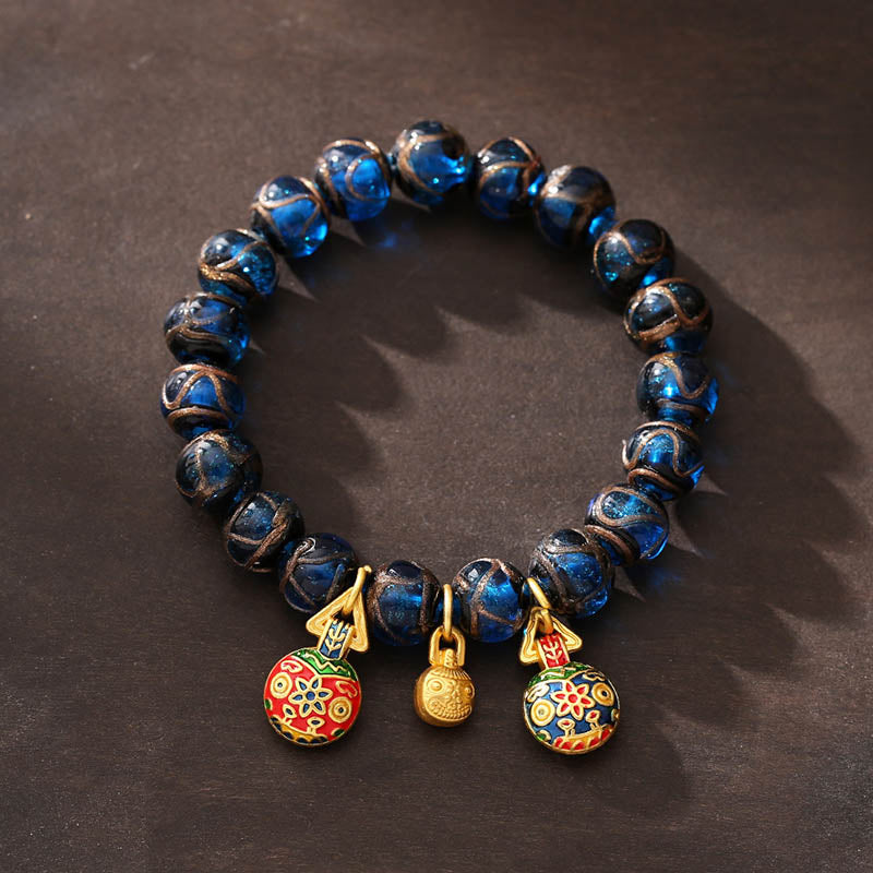 Handcrafted Blue Liuli Glass Bead Bracelet with Gold and Copper Pixiu Focal