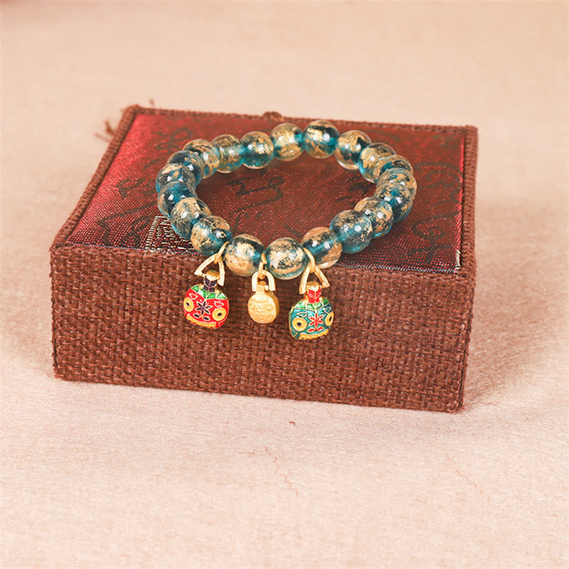 Tibetan Liuli Bead Bracelet with Gold Pixiu and Vajra Dorje Symbols
