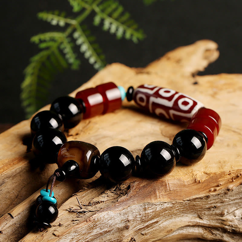 Tibetan Nine-Eye Dzi Bead and Polished Black Onyx Natural Stone Bracelet