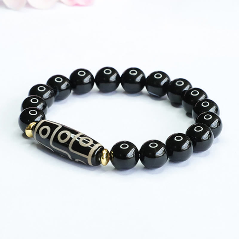 Tibetan Nine-Eye Dzi Bead and Black Onyx Grounding Beaded Bracelet